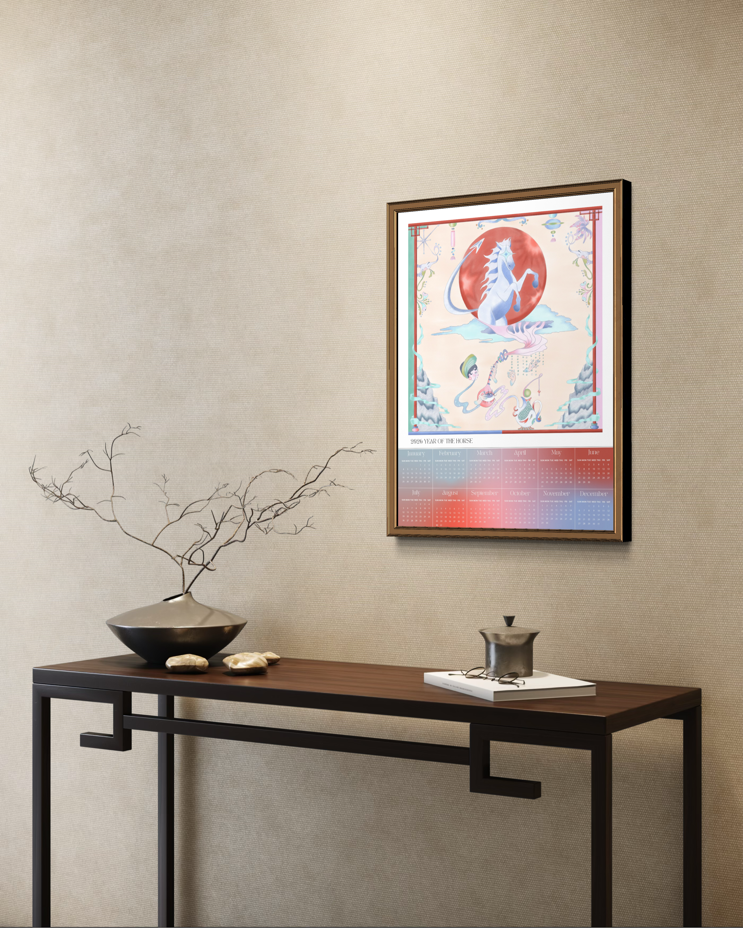 Framed artwork on a wall above a wooden console table with decorative items.